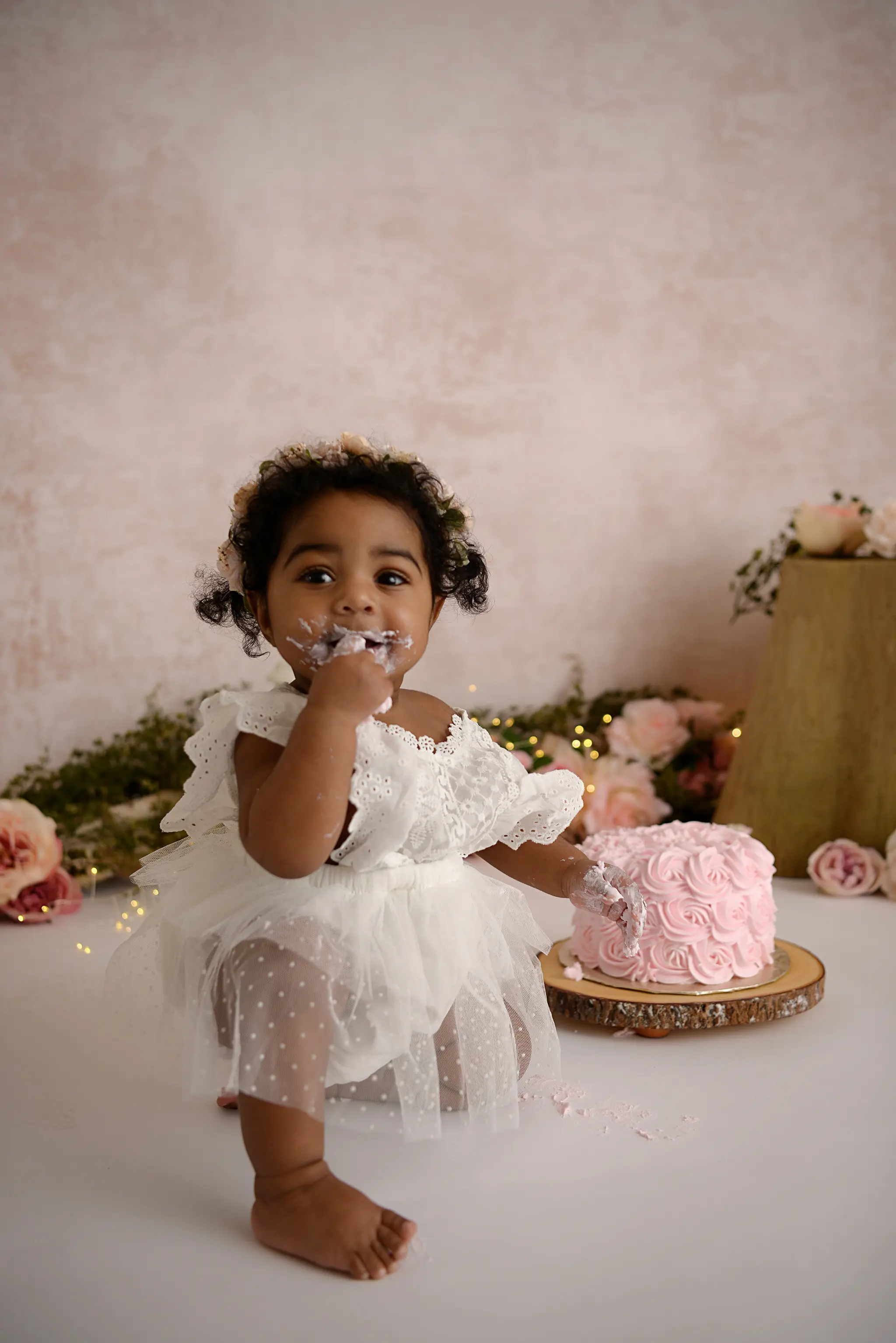 baby eating cake photographer